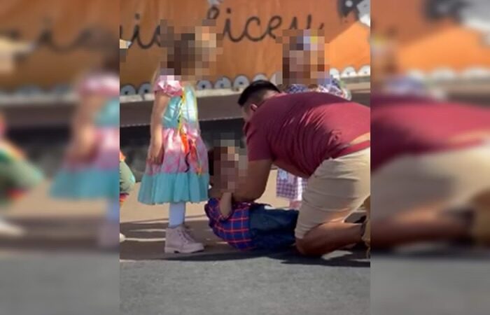 Criança é agredida por adulto durante festa escolar